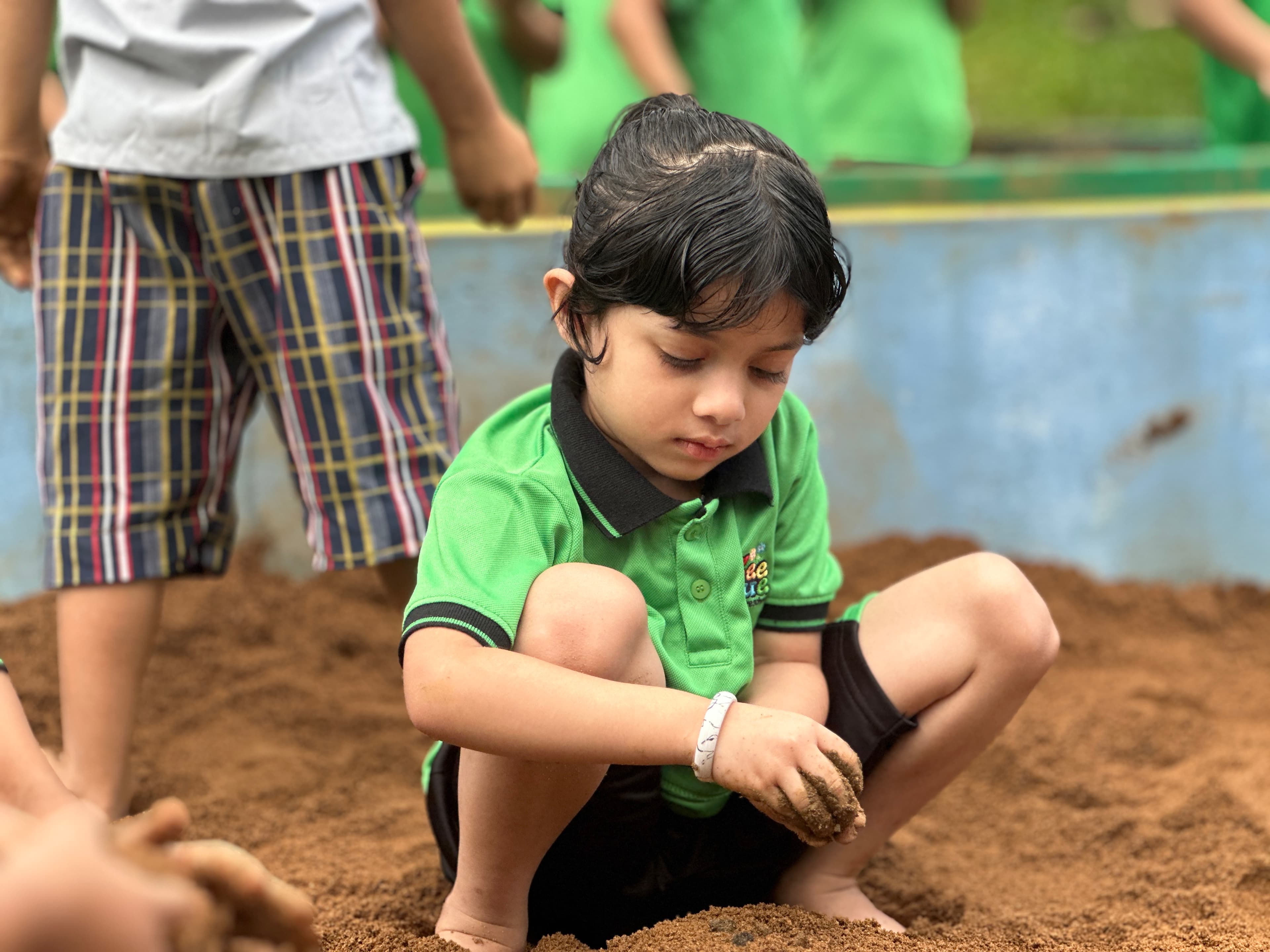 Students participating in interactive classroom learning at Zeeque Preschool in Kerala.