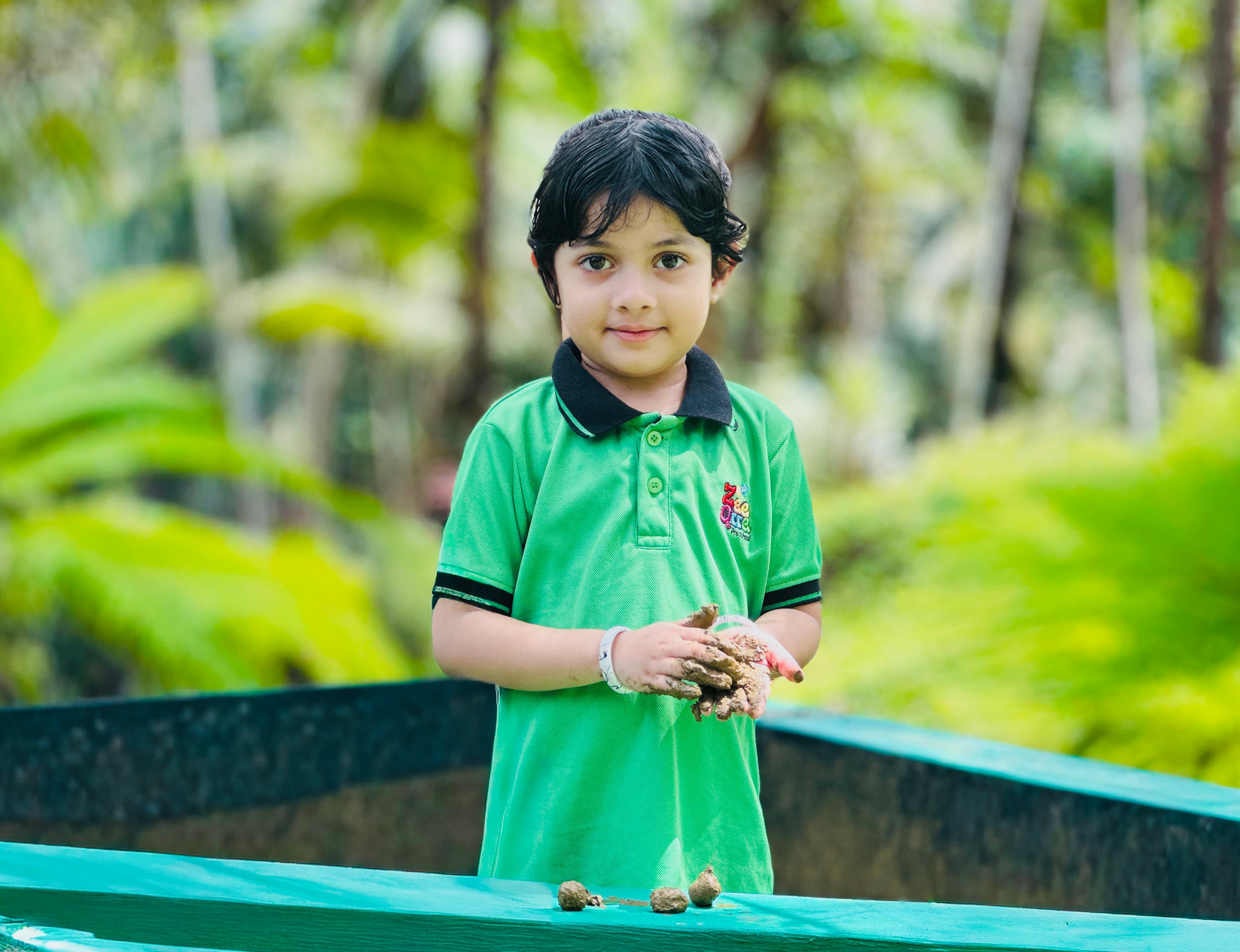 Toddlers enjoying creative play time in our safe preschool environment in Kozhikode, Kerala.