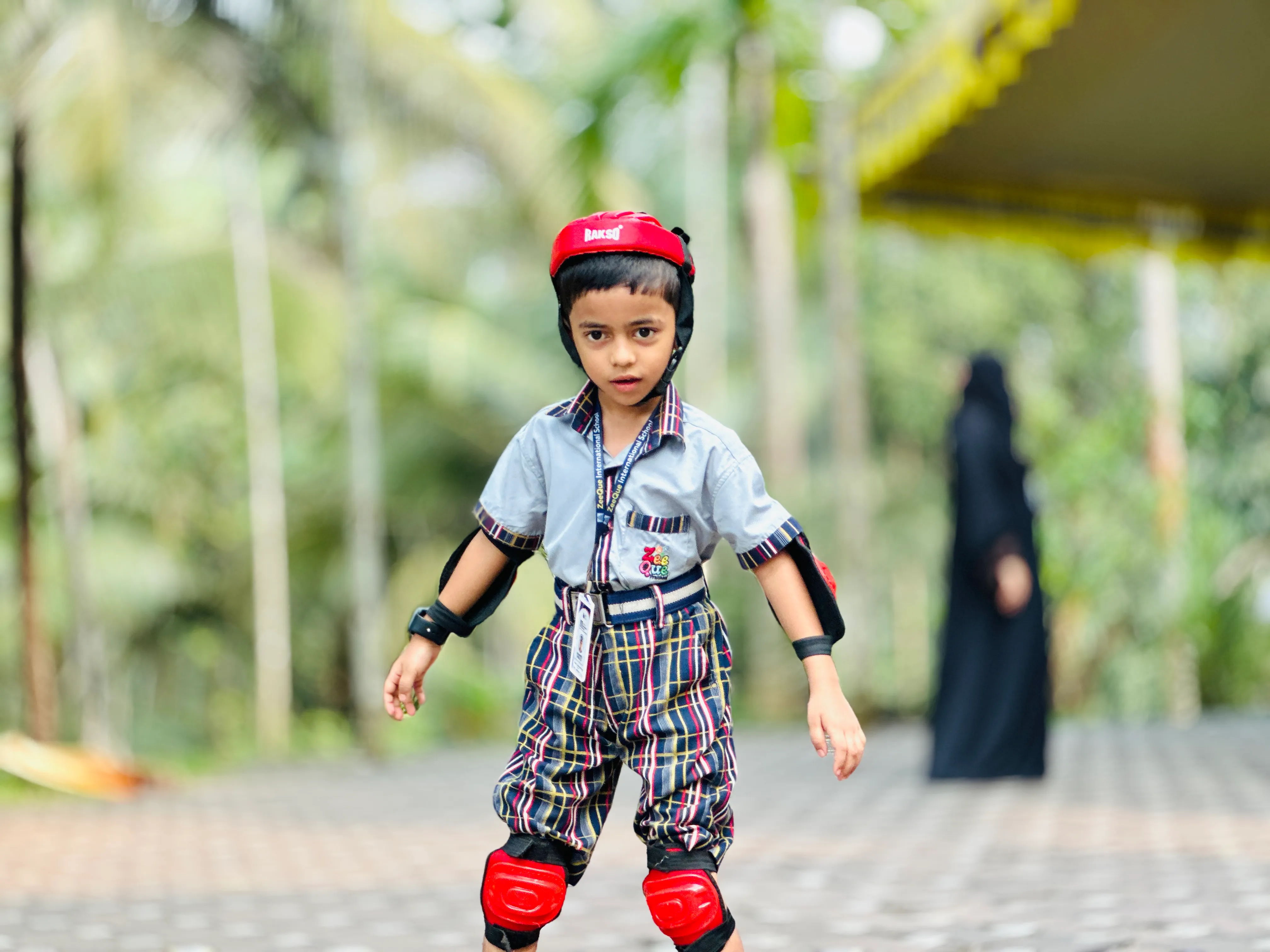 Kids reading together and sharing traditional Islamic values at ZeeQue Preschool in Kerala.